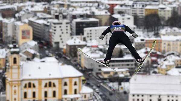 Germany's Karl Geiger soars through the air during his trainings jump at the third stage of the Four-Hills Ski Jumping tournament (Vierschanzentournee), in Innsbruck, Austria, on January 3, 2019. - The third competition of the Four-Hills Ski jumping event takes place in Innsbruck, before the tournament ends in Bischofshofen (Austria). (Photo by Christof STACHE / AFP)        (Photo credit should read CHRISTOF STACHE/AFP via Getty Images)