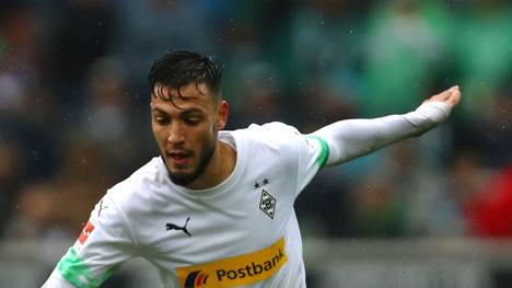 MOENCHENGLADBACH, GERMANY - OCTOBER 06: Ramy Bensebaini of Borussia Monchengladbach of Borussia Monchengladbach in action during the Bundesliga match between Borussia Moenchengladbach and FC Augsburg at Borussia-Park on October 06, 2019 in Moenchengladbach, Germany. (Photo by Dean Mouhtaropoulos/Bongarts/Getty Images)