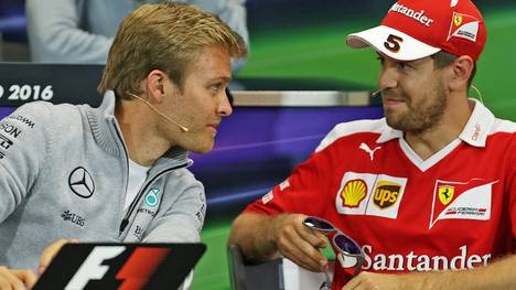 Weltmeister Nico Rosberg (l.) hört auf, daran dachte Sebastian Vettel nach seinem ersten Titel keine Sekunde