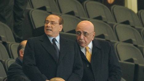 Silvio Berlusconi (l.) hätte sich gerne mehr um den AC Mailand gekümmert