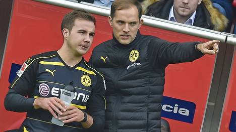 Thomas Tuchel (r., hier mit Mario Götze) hat bei Borussia Dortmund einen Vertrag bis 2018