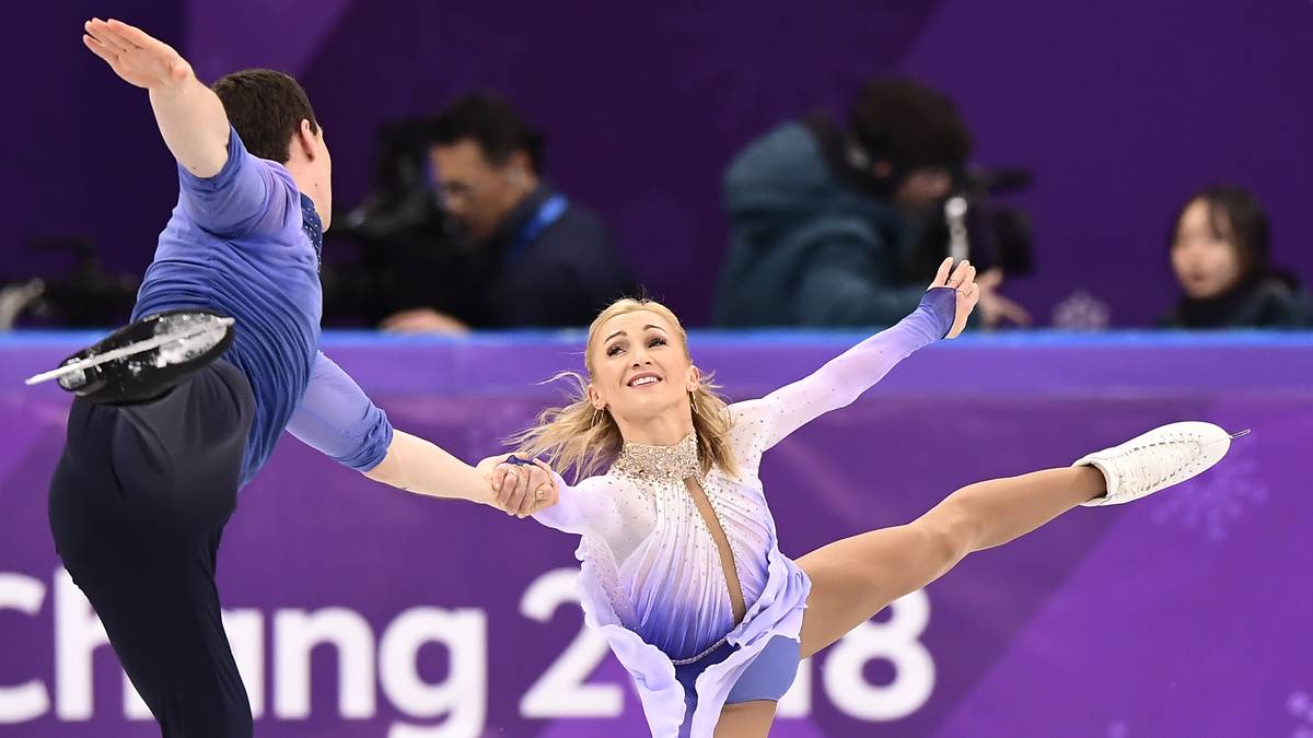 TOP - ALJONA SAVCHENKO: Im Eiskunst-Paarlauf holt sie mit ihrem Partner Bruno Massot ihre erste olympische Goldmedaille