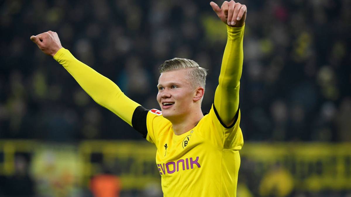 Dortmund's Norwegian forward Erling Braut Haaland celebrates scoring during the German first division Bundesliga football match Borussia Dortmund v FC Cologne in Dortmund, on January 24, 2020. (Photo by Ina FASSBENDER / AFP) / DFL REGULATIONS PROHIBIT ANY USE OF PHOTOGRAPHS AS IMAGE SEQUENCES AND/OR QUASI-VIDEO (Photo by INA FASSBENDER/AFP via Getty Images)