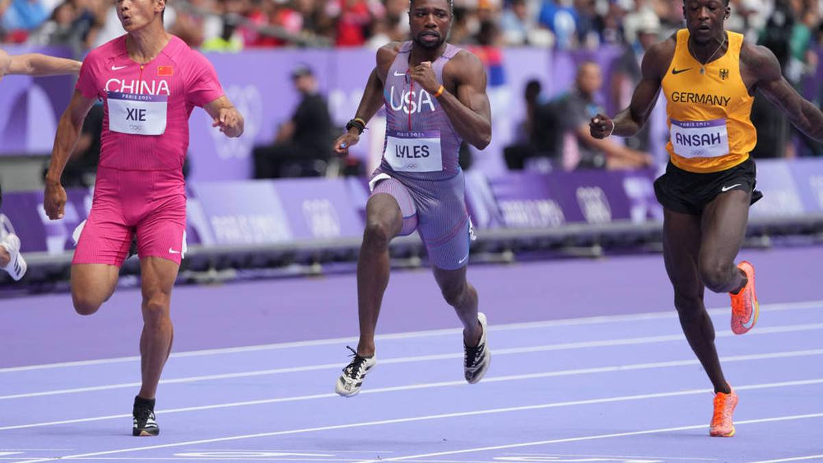 Noah Lyles (USA, Mitte) hofft auf Gold bei Olympia 2024 