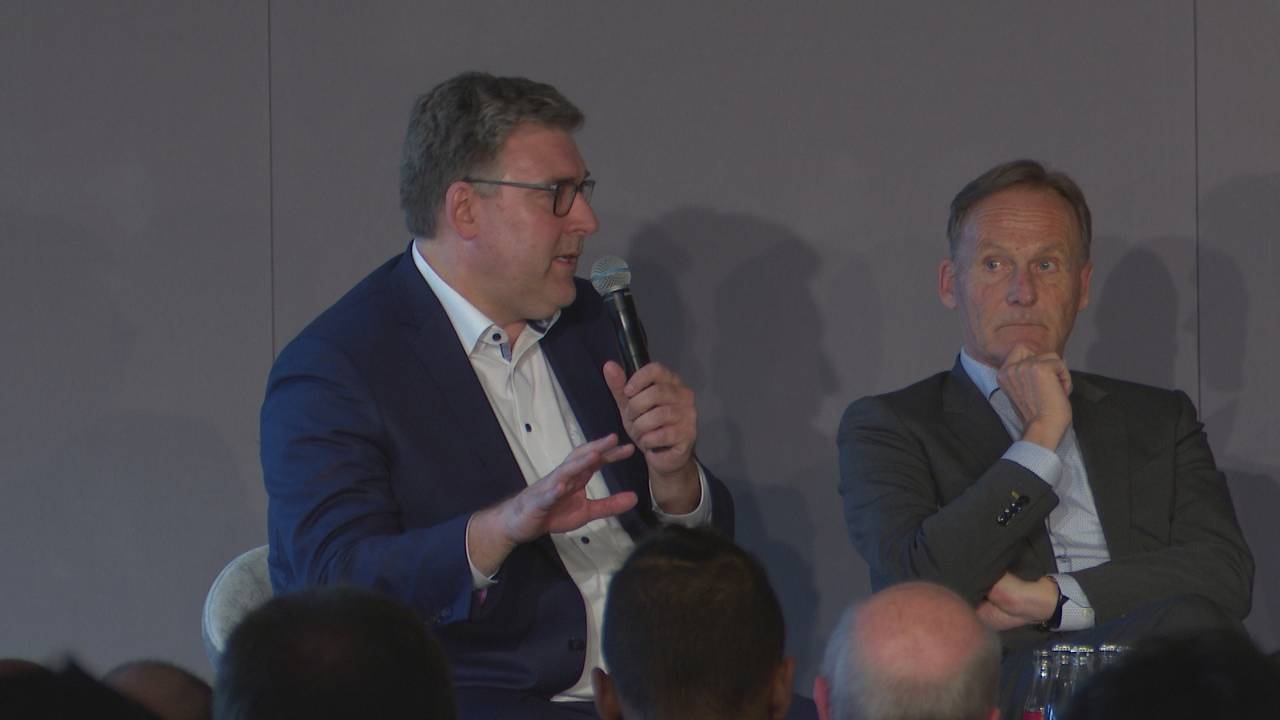 Hier erklären die DFL-Bosse Hellmann und Watzke den nötigen Investoreneinstieg
