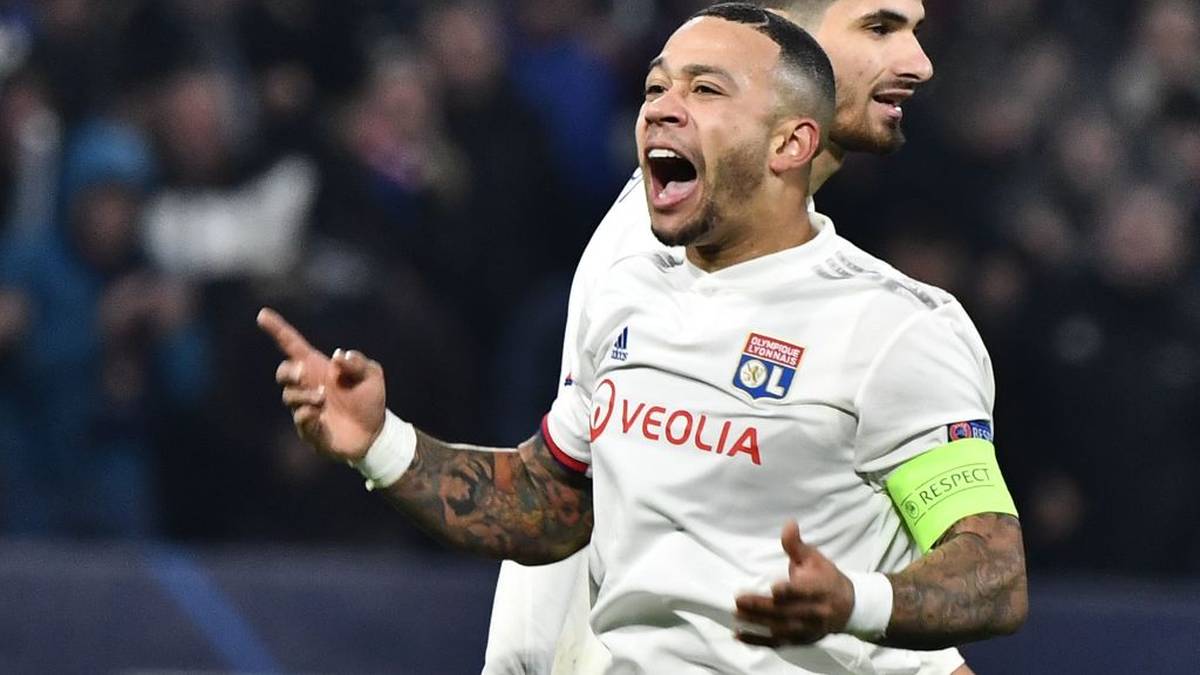 Lyon's Dutch forward Memphis Depay celebrates after scoring a goal during the UEFA Champions League group G football match between Olympique Lyonnais (OL) and RB Leipzig, on December 10, 2019 at the Parc Olympique Lyonnais stadium in Decines-Charpieu near Lyon. (Photo by JEFF PACHOUD / AFP) (Photo by JEFF PACHOUD/AFP via Getty Images)