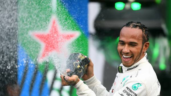MEXICO CITY, MEXICO - OCTOBER 27: Race winner Lewis Hamilton of Great Britain and Mercedes GP celebrates on the podium during the F1 Grand Prix of Mexico at Autodromo Hermanos Rodriguez on October 27, 2019 in Mexico City, Mexico. (Photo by Clive Mason/Getty Images)