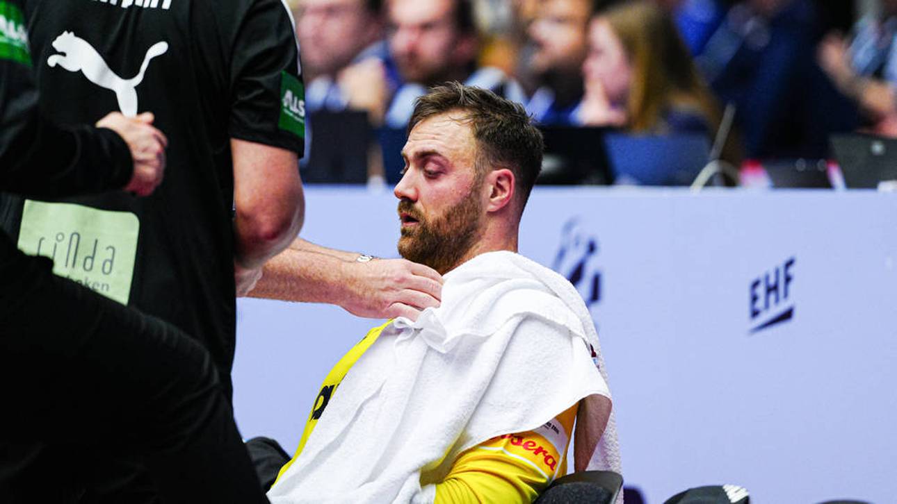 Andreas Wolff muss nach einem Treffer im Gesicht behandelt werden