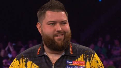 Michael Smith scheitert beim Grand Slam of Darts an James Wade und fliegt damit schon nach der Gruppenphase aus dem Turnier.