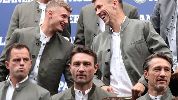 MUNICH, GERMANY - SEPTEMBER 01: Michael Cuisance (L) and Ivan Perisic of FC Bayern Muenchen laugh during the FC Bayern Muenchen and Paulaner photo session at FGV Schmidtle Studios on September 01, 2019 in Munich, Germany. (Photo by Alexandra Beier/Bongarts/Getty Images)