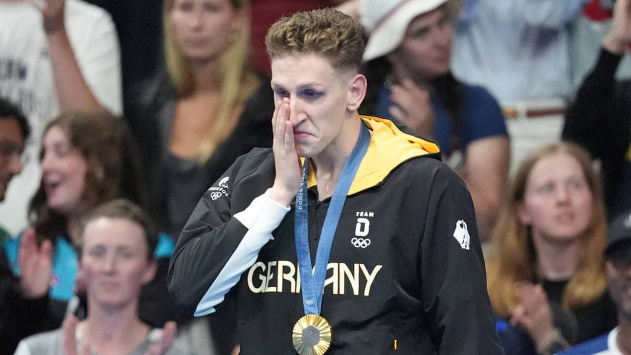 Lukas Märtens - mit der Goldmedaille um den Hals - kämpft gegen die Tränen