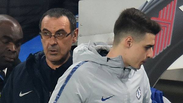 Chelsea's Italian head coach Maurizio Sarri (L) and Chelsea's Spanish goalkeeper Kepa Arrizabalaga arrive back on the pitch after half-time during the English Premier League football match between Chelsea and Tottenham Hotspur at Stamford Bridge in London on February 27, 2019. (Photo by Glyn KIRK / AFP) / RESTRICTED TO EDITORIAL USE. No use with unauthorized audio, video, data, fixture lists, club/league logos or 'live' services. Online in-match use limited to 120 images. An additional 40 images may be used in extra time. No video emulation. Social media in-match use limited to 120 images. An additional 40 images may be used in extra time. No use in betting publications, games or single club/league/player publications. /         (Photo credit should read GLYN KIRK/AFP via Getty Images)