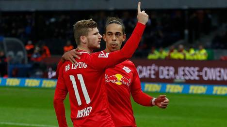 Leipzig's German forward Timo Werner celebrate scoring from the penalty spot with Leipzig's Danish forward Yussuf Poulsen during the German first division Bundesliga football match Hertha BSC Berlin v RB Leipzig, at the Olymic Stadium in Berlin on November 9, 2019. (Photo by Odd ANDERSEN / AFP) / RESTRICTIONS: DFL REGULATIONS PROHIBIT ANY USE OF PHOTOGRAPHS AS IMAGE SEQUENCES AND/OR QUASI-VIDEO (Photo by ODD ANDERSEN/AFP via Getty Images)