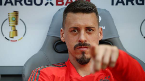 BERLIN, GERMANY - MAY 19: Sandro Wagner of Muenchen points at the camera as he sits on the bench during the DFB Cup final between Bayern Muenchen and Eintracht Frankfurt at Olympiastadion on May 19, 2018 in Berlin, Germany. (Photo by Maja Hitij/Bongarts/Getty Images)