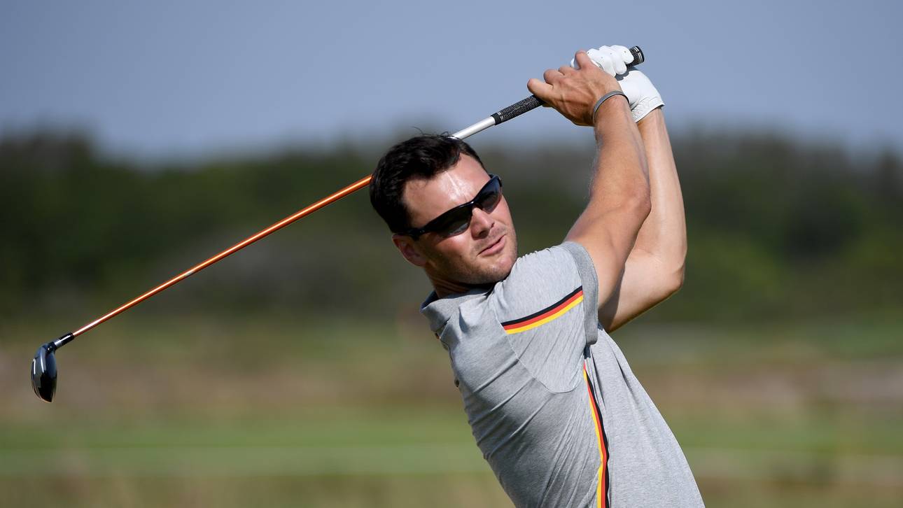 Golfer Kaymer im Flight mit Watson