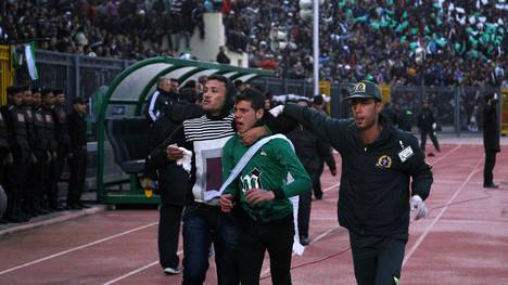 A wounded Egyptian fan of Al-Masry is es