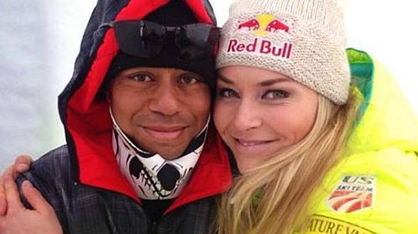 Happy trotz ausgeschlagenem Schneidezahn: Lindsey Vonn und Tiger Woods.