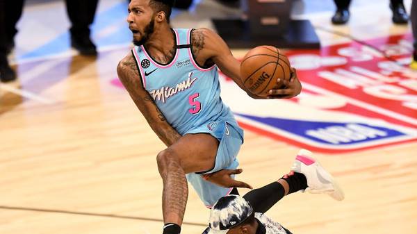 CHICAGO, ILLINOIS - FEBRUARY 15: Derrick Jones Jr. #5 of the Miami Heat leaps over Bam Adebayo #13 of the Miami Heat in the 2020 NBA All-Star - AT&T Slam Dunk Contest during State Farm All-Star Saturday Night at the United Center on February 15, 2020 in Chicago, Illinois. NOTE TO USER: User expressly acknowledges and agrees that, by downloading and or using this photograph, User is consenting to the terms and conditions of the Getty Images License Agreement. (Photo by Stacy Revere/Getty Images)