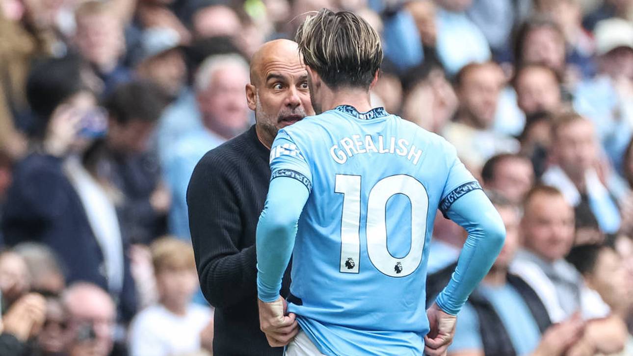 Pep Guardiola im Gespräch mit Jack Grealish