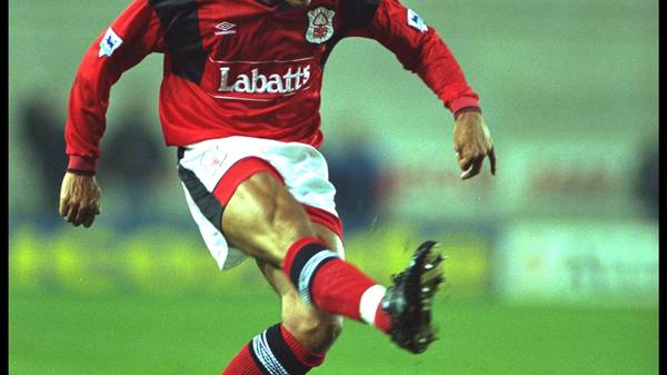 7 NOV 1994:  STAN COLLYMORE OF NOTTINGHAM FOREST FIRES OFF A SHOT DURING THE FOREST V NEWCASTLE PREMIER LEAGUE MATCH PLAYED AT THE CITY GROUND. THE MATCH ENDED IN A 0-0 DRAW.