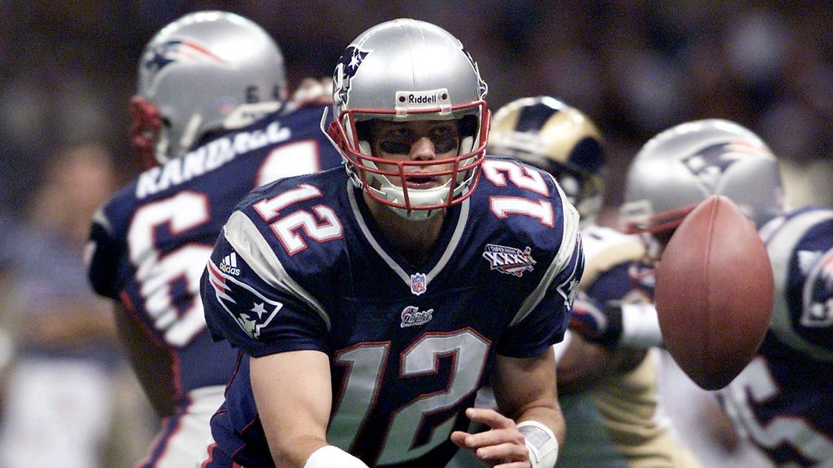 New England Patriots quarterback Tom Brady pitches
