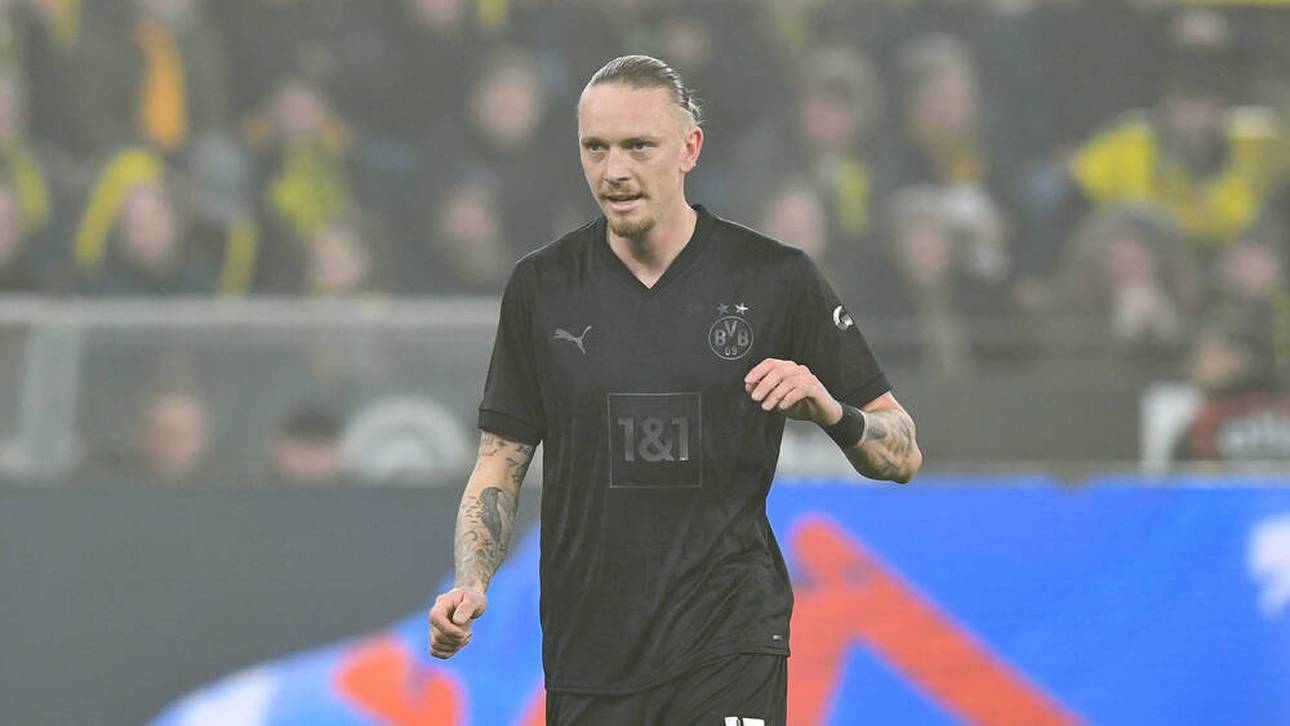 Marius Wolf spendet sein BVB-Sondertrikot