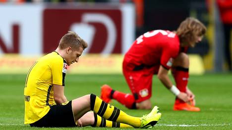Marco Reus (l.) verletzte sich gegen Bayer Leverkusen