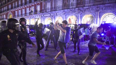Police clash with Leicester City fans in Madrid