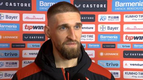 Die Fans von Borussia Mönchengladbach skandieren nach dem 0:0 in Leverkusen: "Ihr werdet nie deutscher Meister!" Robert Andrich antwortet gelassen,