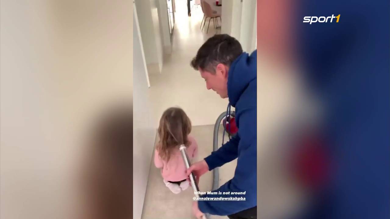 Robert Lewandowski macht seiner Tochter Klara mit einem Staubsauger einen Zopf
