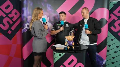 Luke Woodhouse steht nach seinem Sieg über Damon Heta im Achtelfinale der Darts-WM 2025. Im Interview erklärt er, warum er trotz Rückstand den Neun-Darter seines Gegners bejubelte.