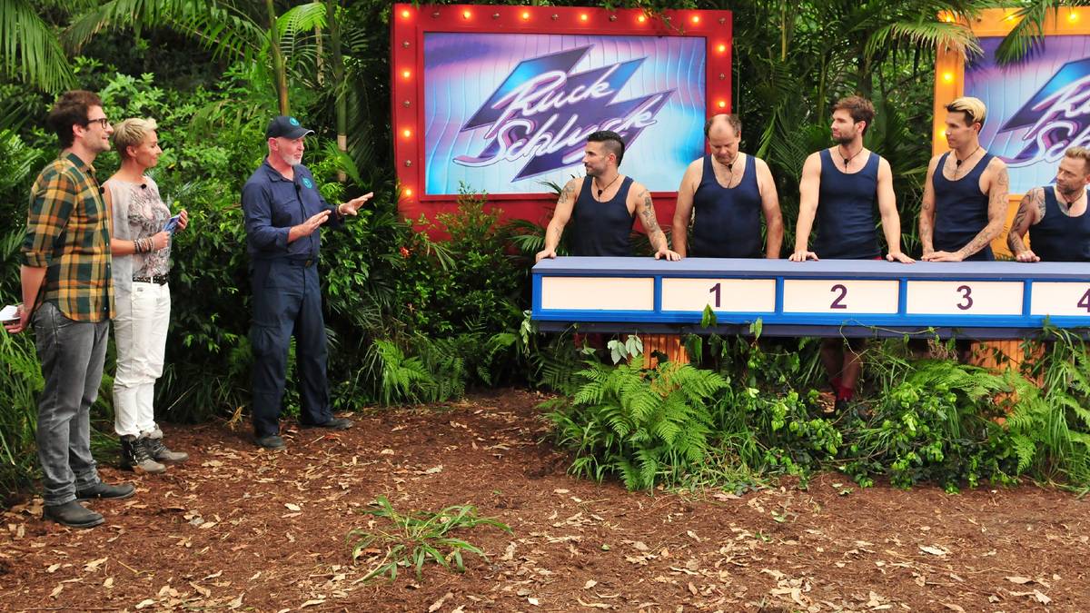 Am Tag 8 muss Häßler wieder ran: Es steht die Dschungelprüfung "Ruck Schluck" an. Wie im Showklassiker "Ruck Zuck" müssen Begriffe erklärt werden, aber Dschungel-Arzt Dr. Bob teilt mit, dass das noch nicht alles ist