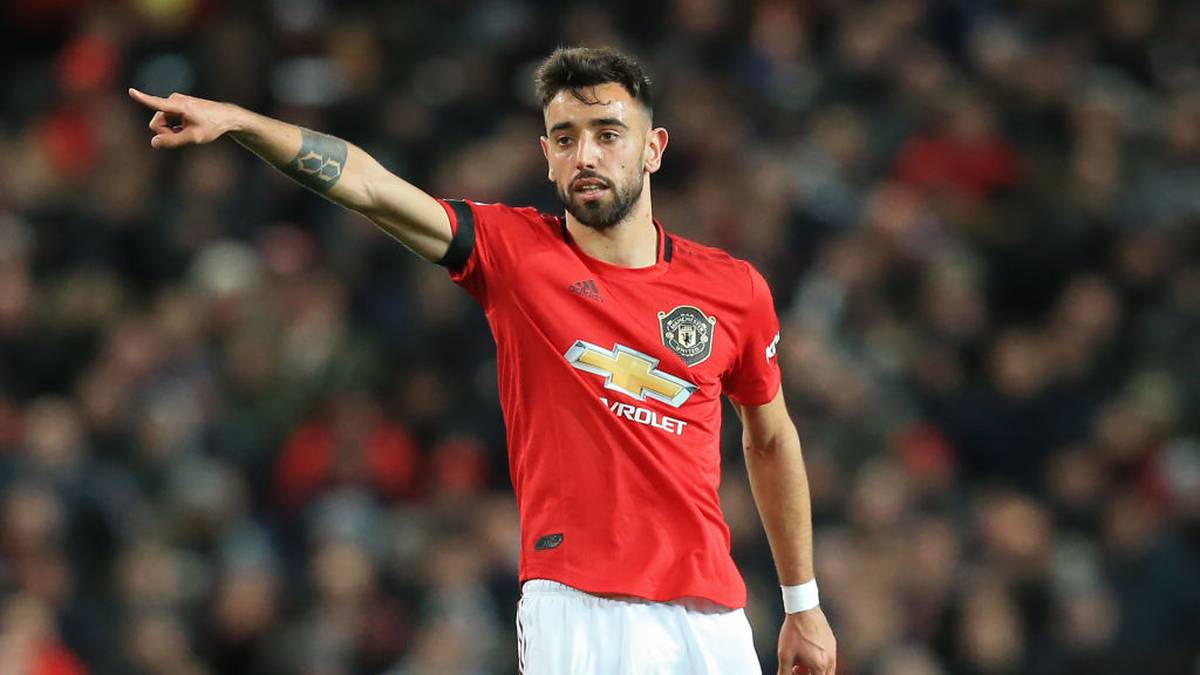 Manchester United's Portuguese midfielder Bruno Fernandes gestures during the English Premier League football match between Manchester United and Wolverhampton Wanderers at Old Trafford in Manchester, north west England, on February 1, 2020. (Photo by Lindsey Parnaby / AFP) / RESTRICTED TO EDITORIAL USE. No use with unauthorized audio, video, data, fixture lists, club/league logos or 'live' services. Online in-match use limited to 120 images. An additional 40 images may be used in extra time. No video emulation. Social media in-match use limited to 120 images. An additional 40 images may be used in extra time. No use in betting publications, games or single club/league/player publications. /  (Photo by LINDSEY PARNABY/AFP via Getty Images)