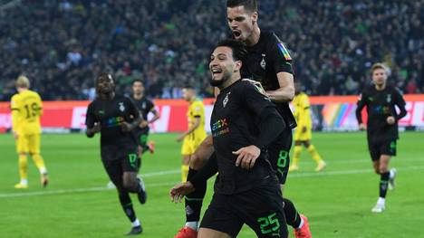 Nach Borussia Dortmund hat wohl auch Atletico Madrid Interesse an Ramy Bensebaini. Der Vertrag des Linksverteidigers läuft am Saisonende aus.