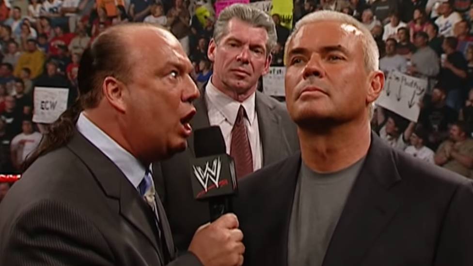 Vince McMahon (M.) holt Paul Heyman (l.) und Eric Bischoff für RAW und SmackDown ins Boot