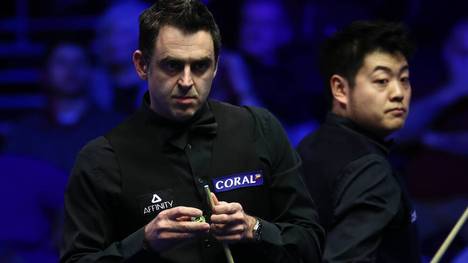 Liang Wenbo (r., mit Ronnie O'Sullivan) ist der prominenteste Betroffene des Snooker-Skandals