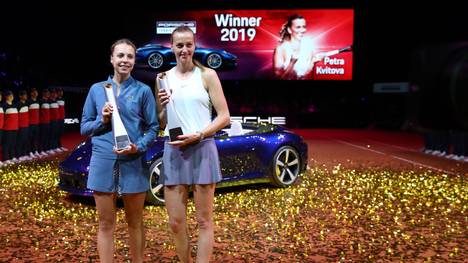 STUTTGART, GERMANY - APRIL 28: Petra Kvitova (R) of Czech Republic celebrates with the trophy after winning the final match against Anett Kontaveit of Estonia on day 7 of the Porsche Tennis Grand Prix at Porsche-Arena on April 28, 2019 in Stuttgart, Germany. (Photo by Alex Grimm/Getty Images)