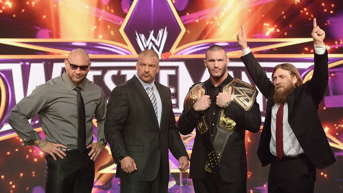 Batista (l.) und Triple H (2.v.l., mit Randy Orton und Daniel Bryan) waren bei WWE Partner und Rivalen