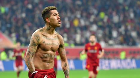 Liverpool's Brazilian midfielder Roberto Firmino celebrates his goal during the 2019 FIFA Club World Cup Final football match between England's Liverpool and Brazil's Flamengo at the Khalifa International Stadium in the Qatari capital Doha on December 21, 2019. (Photo by Giuseppe CACACE / AFP) (Photo by GIUSEPPE CACACE/AFP via Getty Images)
