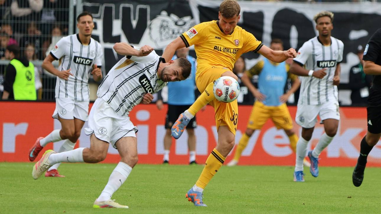 Christoph Daferner (M.) im Zweikampf mit Lukasz Poreba