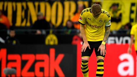 Dortmund's German forward Marco Reus stands on the field during the German first division Bundesliga football match between Borussia Dortmund and VfL Wolfsburg on November 2, 2019 in Dortmund, western Germany. (Photo by INA FASSBENDER / AFP) / DFL REGULATIONS PROHIBIT ANY USE OF PHOTOGRAPHS AS IMAGE SEQUENCES AND/OR QUASI-VIDEO (Photo by INA FASSBENDER/AFP via Getty Images)