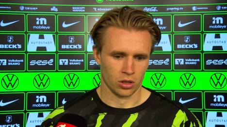 Beim Spiel zwischen Wolfsburg und dem FC Bayern sorgte eine Elfmeter-Szene für Gesprächsstoff. Vor Harry Kanes verschossenem Strafstoß war in den TV-Bildern zu sehen, wie Wolfsburgs Jeanuel Belocian den Elfmeterpunkt bearbeitete. Das sagen die Wolfsburger dazu.