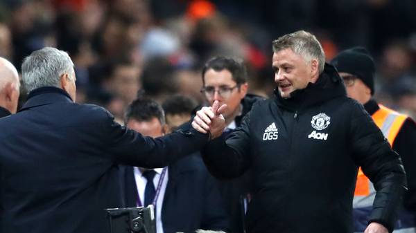 MANCHESTER, ENGLAND - DECEMBER 04: Ole Gunnar Solskjaer, Manager of Manchester United shakes hands with Jose Mourinho, Manager of Tottenham Hotspur prior to the Premier League match between Manchester United and Tottenham Hotspur at Old Trafford on December 04, 2019 in Manchester, United Kingdom. (Photo by Michael Steele/Getty Images)