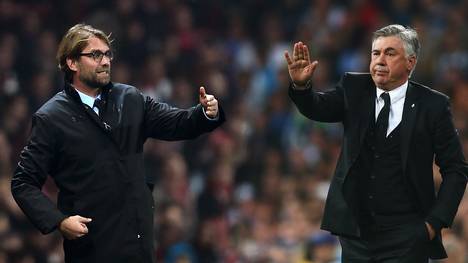 Jürgen Klopp (l.) trifft am Mittwoch mit dem FC Liverpool auf Carlo Ancelotti und den SSC Neapel