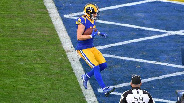 LOS ANGELES, CA - DECEMBER 29: Cooper Kupp #18 of the Los Angeles Rams scores a touchdown against the Arizona Cardinals in the second quarter at Los Angeles Memorial Coliseum on December 29, 2019 in Los Angeles, California. (Photo by John McCoy/Getty Images)