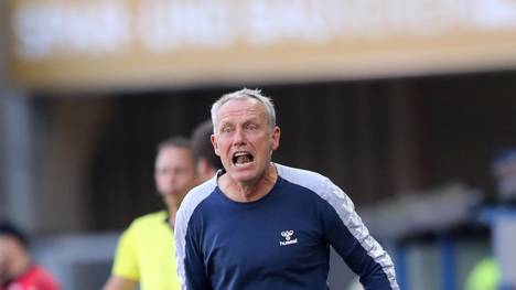 PADERBORN, GERMANY - AUGUST 24: Christian Streich, Manager of SC Freiburg reacts during the Bundesliga match between SC Paderborn 07 and Sport-Club Freiburg at Benteler Arena on August 24, 2019 in Paderborn, Germany. (Photo by Christof Koepsel/Bongarts/Getty Images)