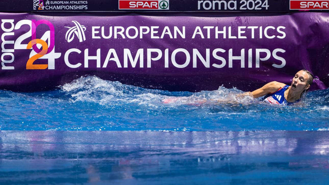 Slapstick! Läuferin taucht in Wassergraben