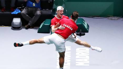 MADRID, SPAIN - NOVEMBER 23: Denis Shapovalov and Vasek Pospisil of Canada celebrate victory in the semi final doubles match between Russia and Canada during Day Six of the 2019 Davis Cup at La Caja Magica on November 23, 2019 in Madrid, Spain. (Photo by Alex Pantling/Getty Images)