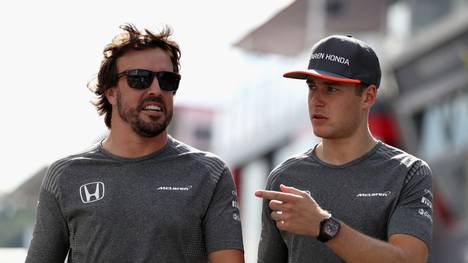 SPIELBERG, AUSTRIA - JULY 07: Stoffel Vandoorne of Belgium and McLaren Honda and Fernando Alonso of Spain and McLaren Honda talk in the Paddock during practice for the Formula One Grand Prix of Austria at Red Bull Ring on July 7, 2017 in Spielberg, Austria.  (Photo by Mark Thompson/Getty Images)