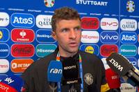 Nationalspieler Thomas Müller spricht in der Mixed Zone über einen möglichen Rücktritt aus dem DFB-Team.
